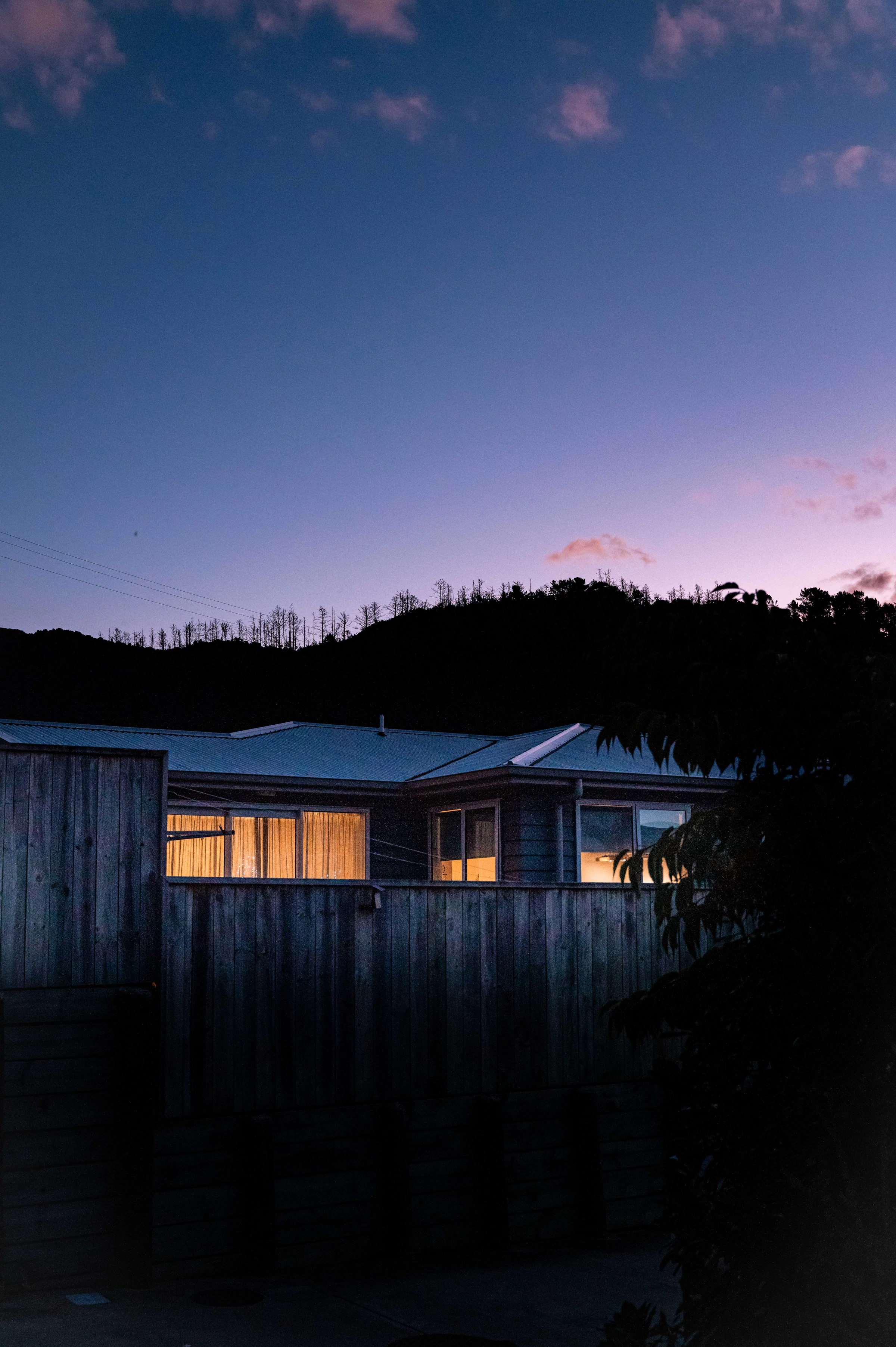 Contemporary home illuminated at dusk